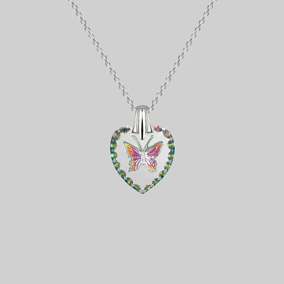 NEW DAWN. Butterfly Engraved Glass Heart Necklace - Silver